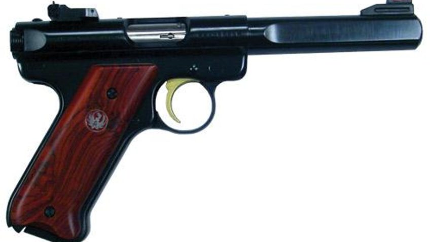 RUGER MKIII 5.5 SLABSIDE BL AS COCOBOLO GRIPS GOLD TRIG – 10+1 Rounds, 5.5″ Barrel, Wood Grips, Blue/Black, Night Sights